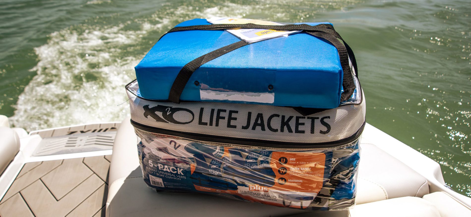 X2O life jackets sitting on the back of a boat